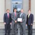 From left: Patrick Everman, chair of the Negotiation Board and student coach; Drew Taggart; Brad Cook; and Professor Mercer Bullard, faculty coach
