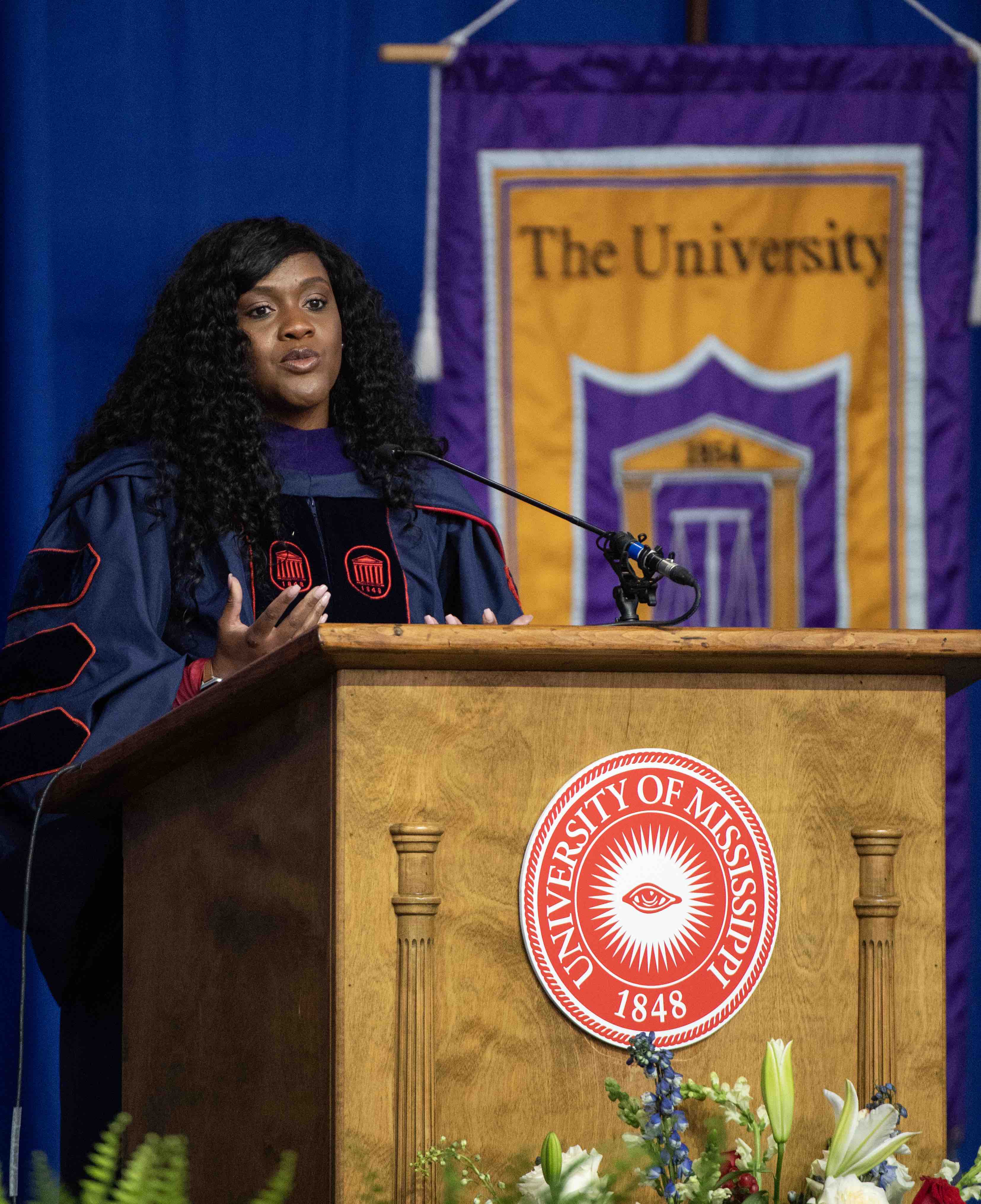 Alumnus speaking at commencement