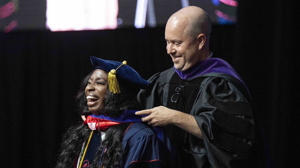 Person being hooded with a law degree