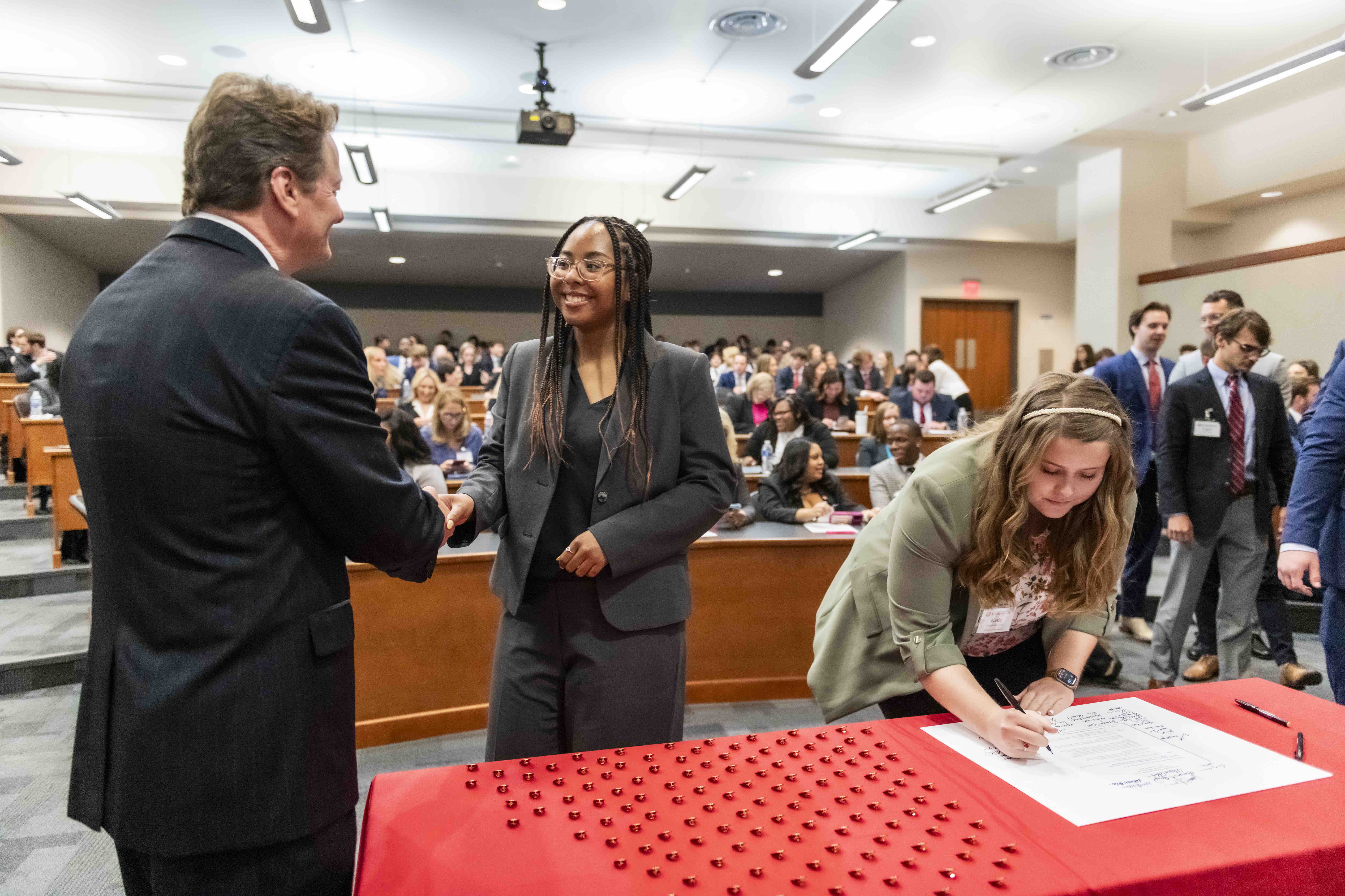 Law student and Dean at orientation